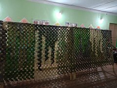 В Красавском поселении волонтеры продолжают плести маскировочные сети